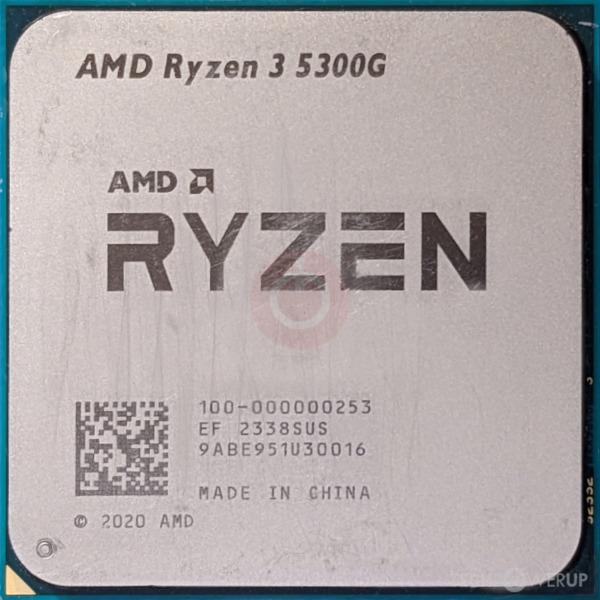 AMD Ryzen 3 5300G desktop APU chip, top view showing IHS markings and part number label